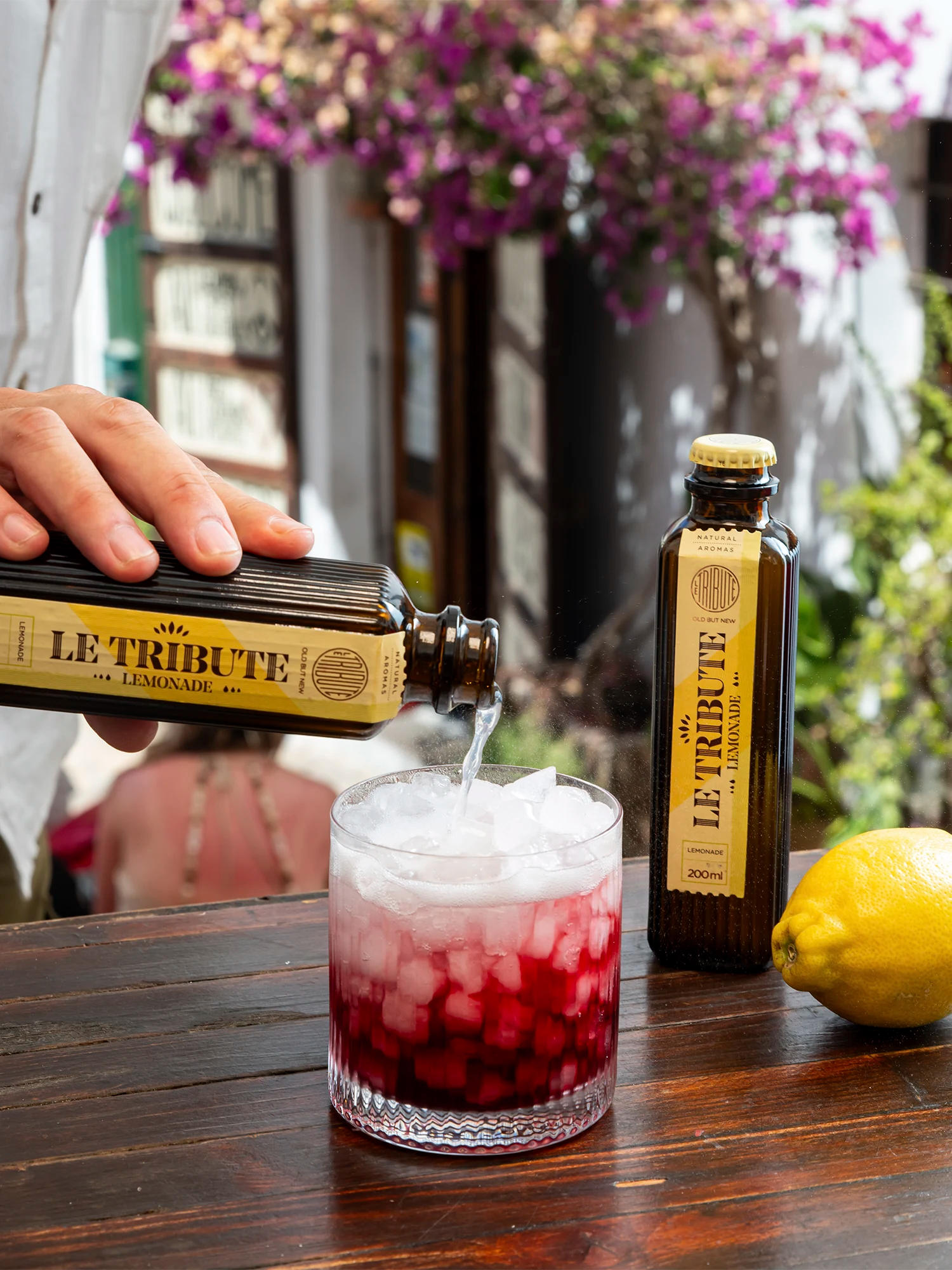 Creating a delicious lemonade cocktail with LE Tribute, perfect for outdoor occasions