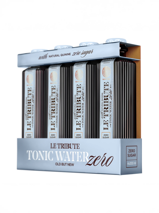 LE Tribute Tonic Water Zero Sugar 4-pack: Premium mixer with natural quinine and zero sugar, presented in an elegant silver and blue gift box