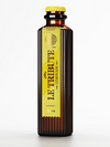 LE Tribute Lemonade: Detailed view of the bottle with ribbed glass and prominent yellow label branding